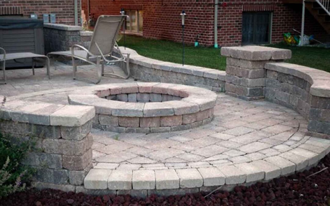 Why Every Backyard Needs a Fire Pit with Seating Wall and Paver Patio